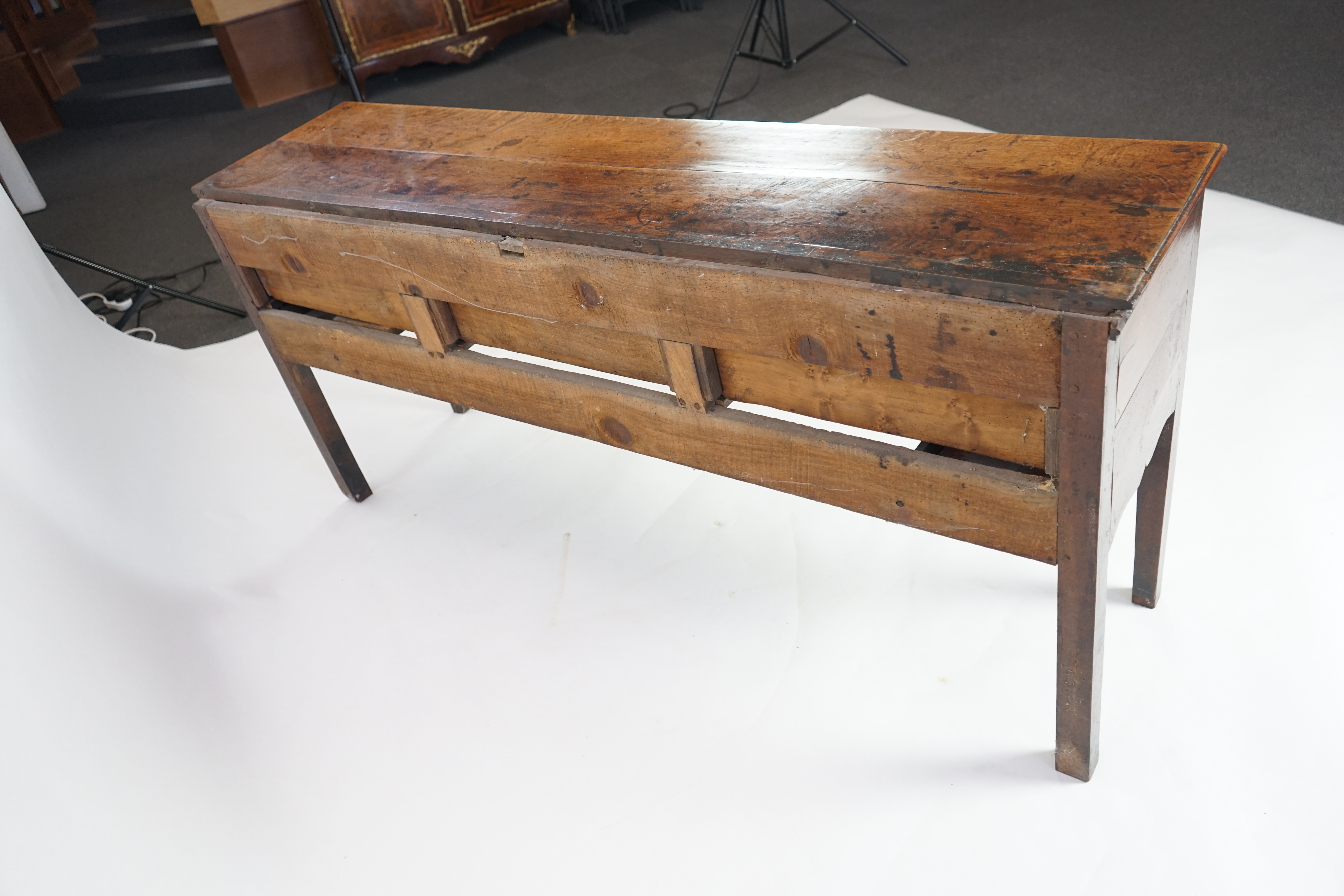 A mid 18th century oak dresser base